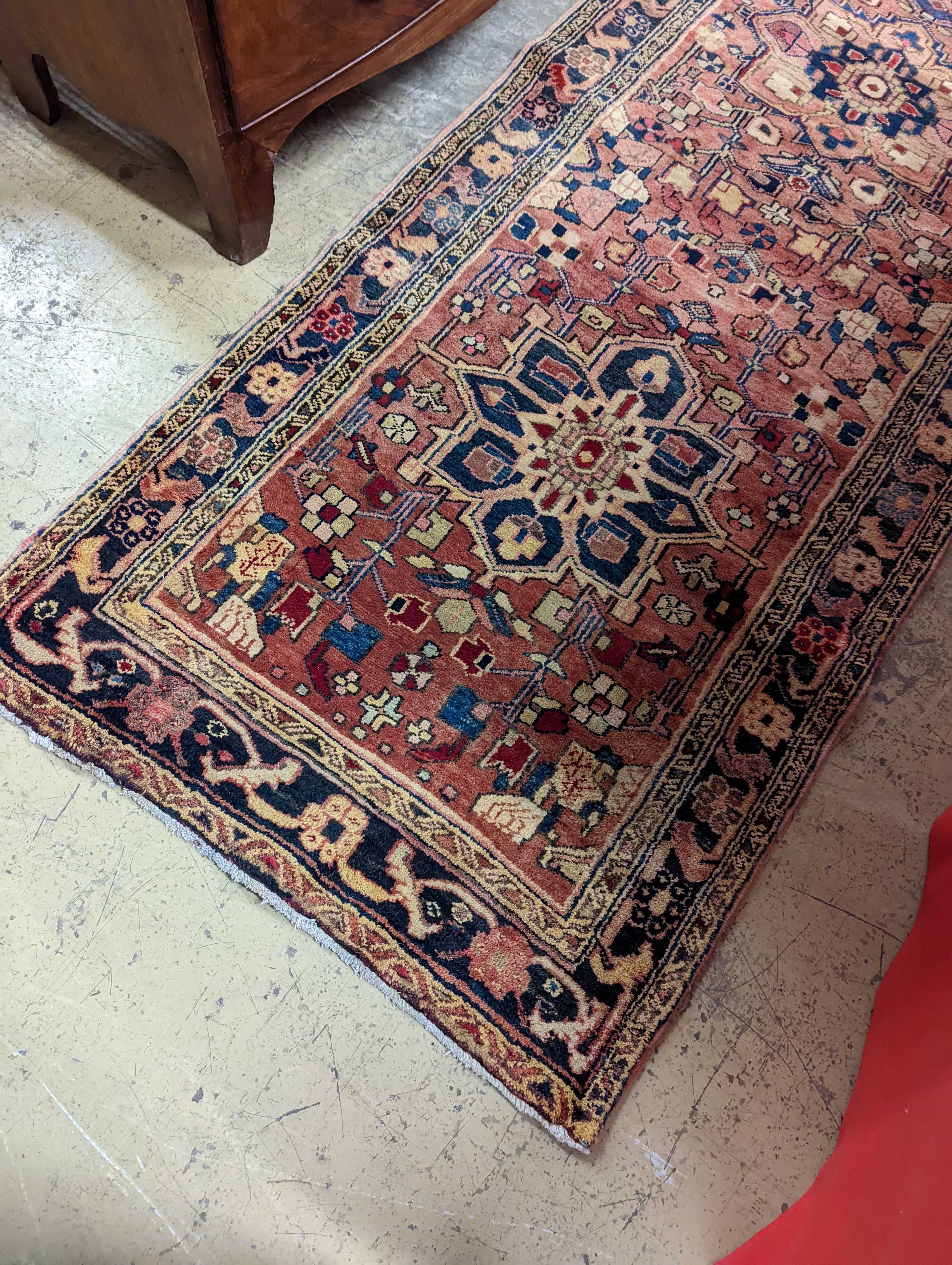 A Karajeh red ground runner, 300 x 100cm